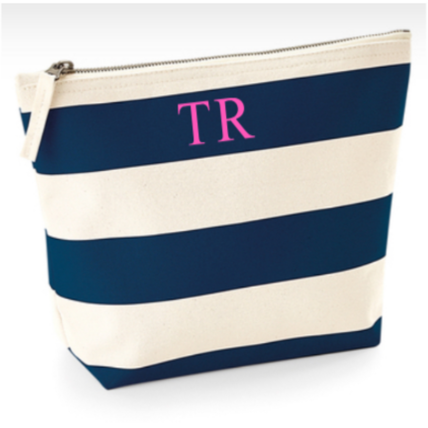 Navy and cream striped cosmetics bag with fluorescent pink initials to front. Handmade by Tallulah Riley